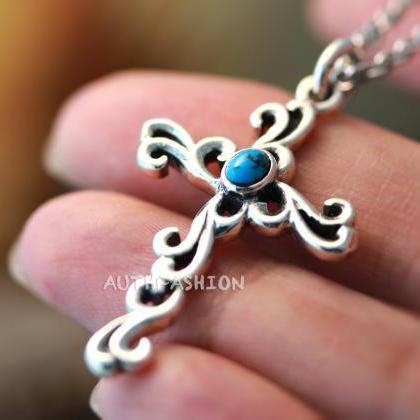 Sterling Silver Turquoise Curly Cross Pendant..