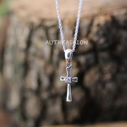 Sterling Silver Tiny Cross Pendant Necklace..